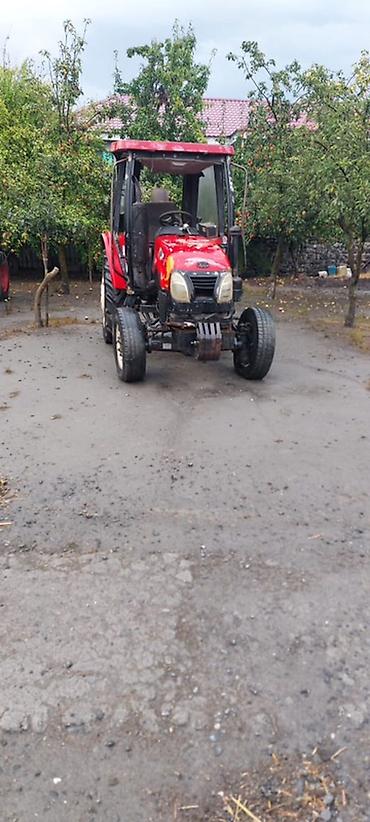 Kommersiya nəqliyyat vasitələri: YTO mini traktor – kabinli, 4 təkərli, arxa asqı sistemi və PTO çıxışı — 1
