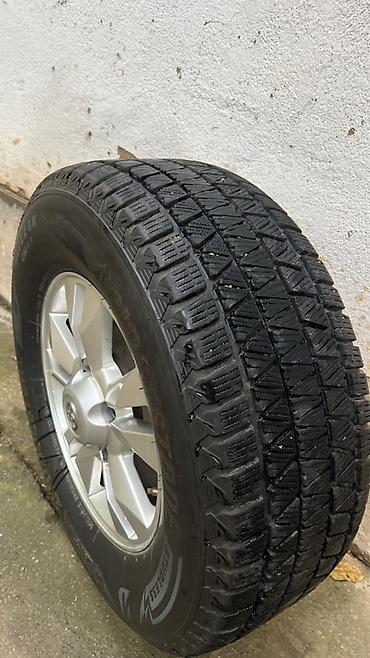 bud e9: Зимнее колесо в сборе: шина Bridgestone Blizzak DM‑V3 на литом диске — 1