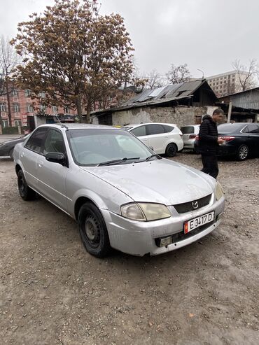 Mazda: Mazda Familia: 1998 г., 1.3 л, Автомат, Бензин, Седан