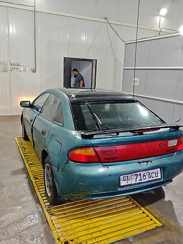 Унаа сатуу: Mazda 323: 1996 г., 1.5 л, Кол менен иштөөчү, Бензин, Хетчбек — 3