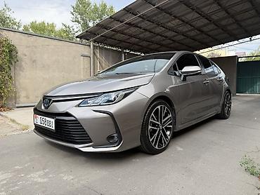 Toyota Corolla: 2021 г., 1.8 л, Автомат, Гибрид, Седан