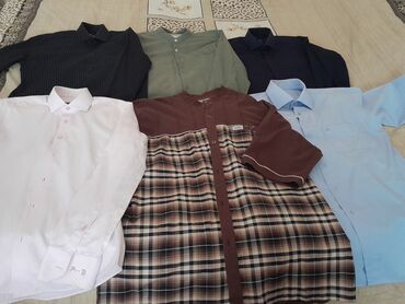 Köynəklər: Мужские рубашки,б/у. Размеpы указаны на фото ( S,L,M,XL). Есть еще — 16