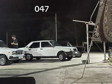 volkswagen tiguan 1: Model: Tofas Şahin (ağ rəng), sedan kuzov Xüsusiyyətlər: - Kuzov: 4 — 1