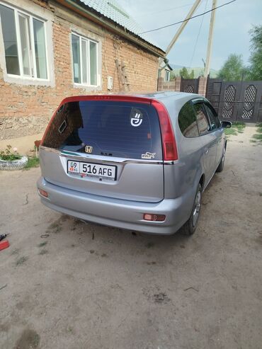 крыло нексия 1: Honda Stream: 2002 г., Минивэн