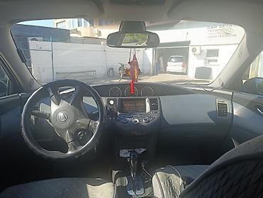 Продажа авто: Nissan Primera: 2004 г., 2 л, Автомат, Газ, Универсал — 4