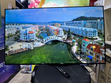 Телевизоры: Телевизор TCL 50V6B, LED, черный Описание Используйте голос для — 4