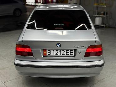 Другие детали салона: BMW — интерьер бизнес-класса с классическим оформлением и богатыми — 23