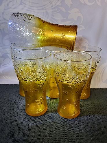 Čaše: Case nove Coca Cola. Case nove,sve na njima odsjaj od — 8