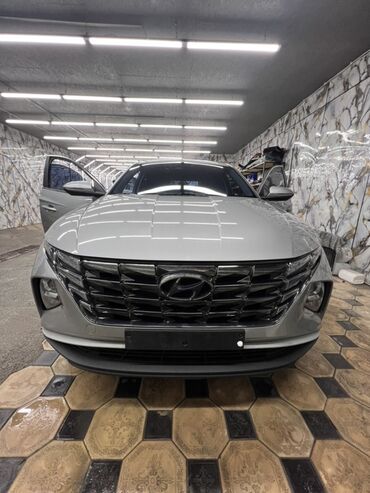 купить машину хендай солярис: Hyundai Tucson серебристого цвета. Этот компактный кроссовер имеет