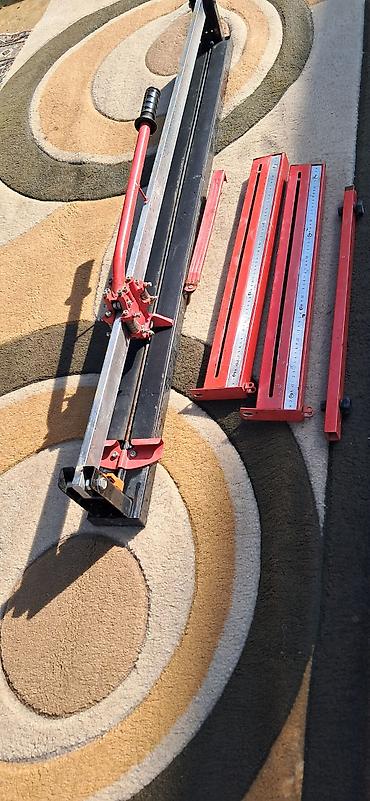 ucuz su çənləri: İşlənmiş Əl ilə çalışan Kafel kəsən stanok, 1200 mm, Zəmanətsiz — 2
