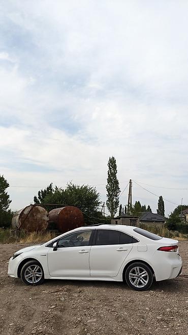 byd e6: Toyota Corolla: 2023 г., 1.8 л, Вариатор, Гибрид, Седан — 4