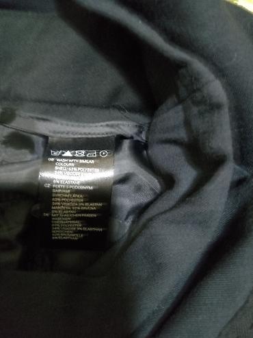 Pantalone: H&M trudnicke pantalone,crna boja.Sasvim nove.Velicina M — 7