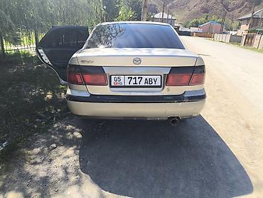 2 тактный: Mazda 626: 1998 г., 1.8 л, Механика, Бензин, Седан — 4