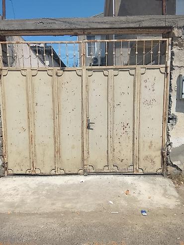 beton panel: Hündürlüyü 2,50/eni 3 m olan darvaza satılır. Qiyməti 350 manat. Ünvan — 1