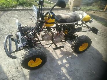 mini canqan: Özəlliklə yığılmış mini ATV/kvadrotsikl - Güc aqreqatı: benzinli tək — 1