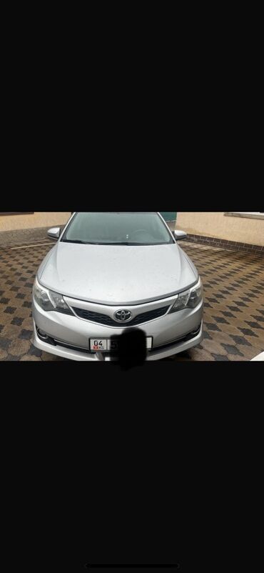 полики для авто бишкек цена: Автомобиль Toyota Camry, серебристого цвета, с элегантным дизайном