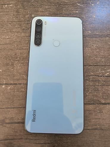 radiator islenmis: Xiaomi 32 GB, rəng - Mavi, 
 İki sim kartlı, Barmaq izi — 2