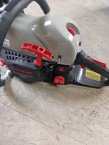 ниже: Бензопила Ubay Tools UB-520 - Тип: бензиновая цепная пила, 2‑тактный — 8