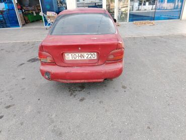 oturacaq uzlukleri: Hyundai Accent sedan – qırmızı rəng. Texniki və komplektasiya