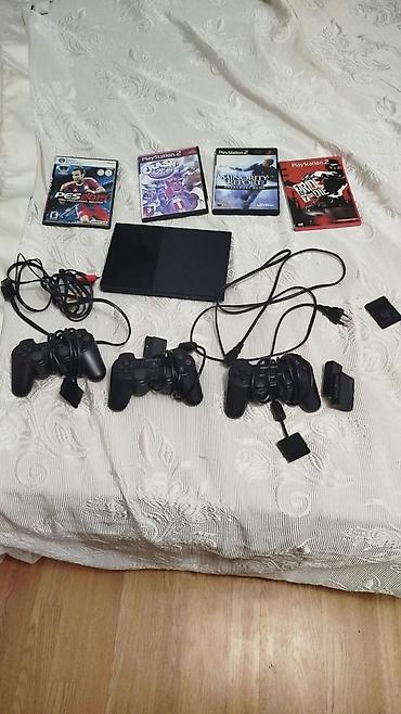 PlayStation 2 Slim (SCPH seriyası) komplekti Paketdə: - PlayStation 2