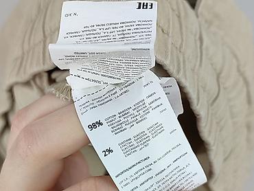pull and bear poznań: Sinsay, Chinosy dla mężczyzn, rozmiar L — 5