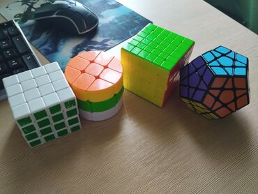 Игрушки: Все кубики-рубика масленныев отличном состоянии кроме 4х4. 6х6 брал