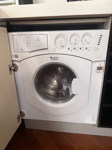 Paltaryuyan maşınlar: Hotpoint Ariston CAWD129 inteqrə edilən paltaryuyan/quruducu maşın