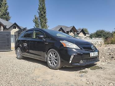 byd e2 2025: Toyota Prius V: 2012 г., 1.8 л, Гибрид, Универсал — 1