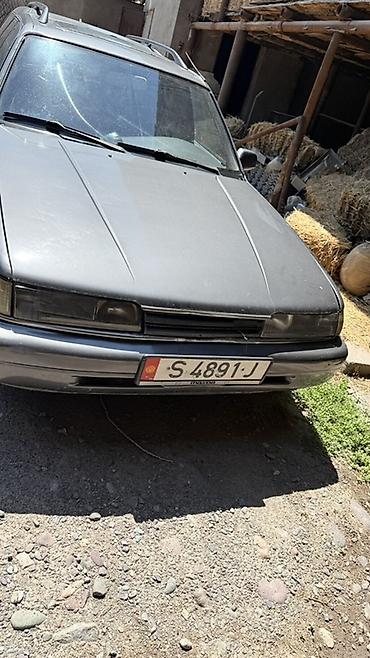 09 машина: Mazda 626: 1990 г., 2 л, Механика, Бензин, Универсал — 1