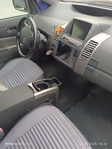 prius salon: Toyota Prius (2-ci nəsil) hibrid hetçbek - Kuzov: hetçbek, tünd boz — 9