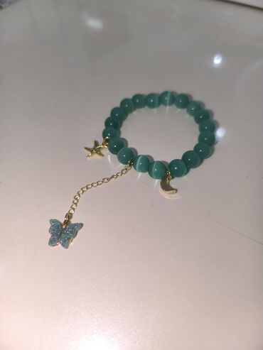 Bilərziklər: Məhsul: Əl işi daş muncuqlu elastik bilərziklər dəsti Təsvir: - Bir — 12