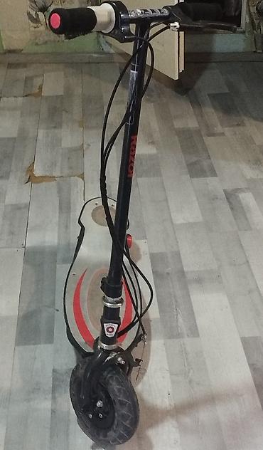 Электротранспорт: Gümüşü və qara rənglərdə olan bu "Razor" elektrikli skuter gəzmək üçün — 3