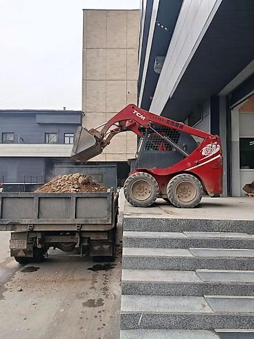 bobcat: Услуги мини-погрузчика TCM (бобкэт) с навесным оборудованием Описание — 1