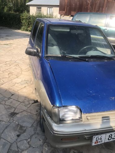 тико машине: Автомобиль Daewoo Tico синего цвета, компактный хэтчбек с пятью