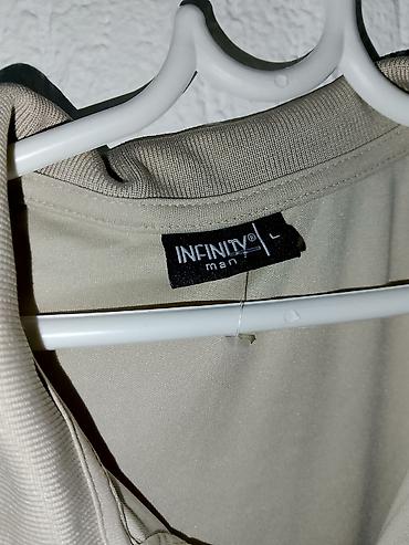 Majice: Muške polo majice – 2 komada Svaka majca po 600dinara 1) Infinity Man — 2