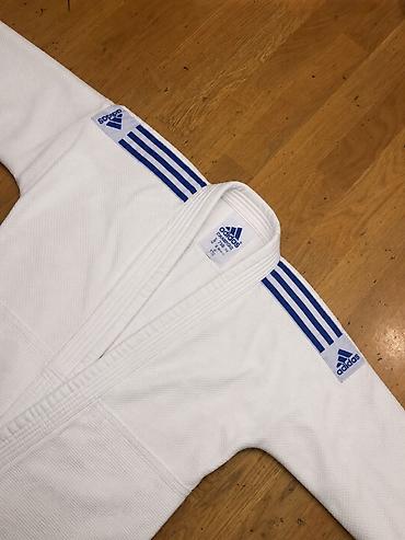 İdman və istirahət: Brend: adidas Rəng: Ağ Növ: Döyüş sənətləri üçün kimono (gi) Material — 2