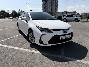 аукцион номер кр: Toyota Corolla: 2021 г., 1.8 л, Вариатор, Гибрид, Седан — 2