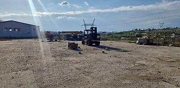 Magacini i radionice: Izdaje se ograđen plac površine 60 ari sa halom od 600 m2, na izuzetno — 3