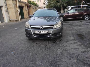 icare avtomobil qalmaq serti ile v Azərbaycan | Yeni il ağacları: Opel Astra: 1.3 l. | 2006 il | 150000 km. | Hetçbek