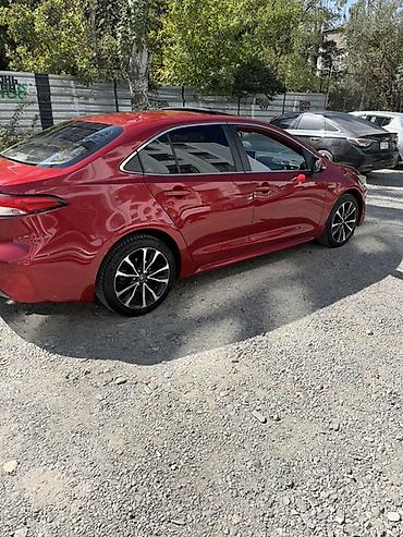 mitsubishi lancer evolution: Toyota Corolla: 2019 г., 1.8 л, Вариатор, Гибрид, Седан — 2