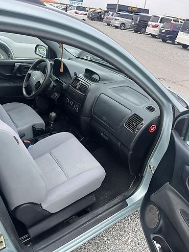 Mitsubishi: Mitsubishi Space Star: 2003 г., 1.3 л, Механика, Бензин, Хэтчбэк — 9