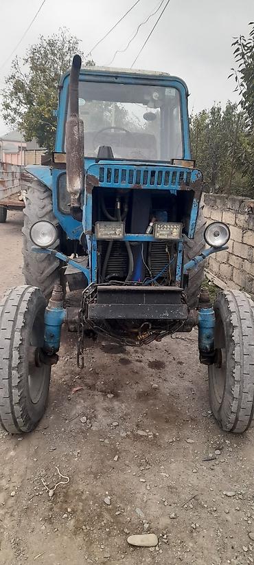 kreditlə masinlar: Mavi rəngli MTZ tipli təkərli traktor Xüsusiyyətlər: - Dizel — 3