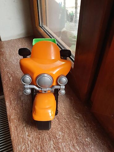 Oyuncaqlar: Uşaq oyuncağı – plastik motosiklet - Parlaq narıncı rəngdə korpus — 1