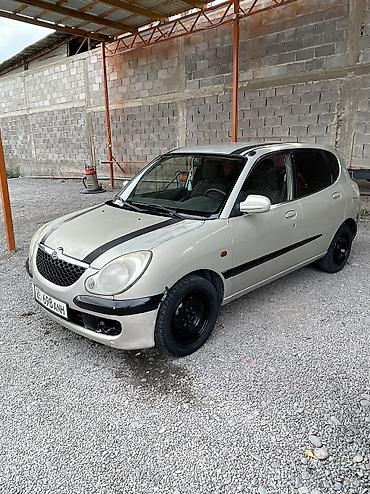 нюрайс машина: Daihatsu Sirion: 2003 г., 1 л, Механика, Бензин, Хэтчбэк — 2