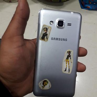 Mobil telefonlar: Samsung Galaxy J2 Prime, rəng - Gümüşü, İki sim kartlı — 2