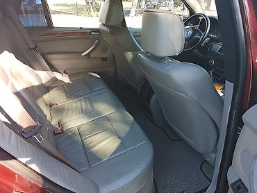 te 28 traktor satisi: BMW X5 (E53), bordoya çalan tünd qırmızı rəngdə SUV. Texniki və — 8