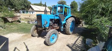 Тракторы МТЗ (Беларус): Трактор МТЗ «Беларус» с кабиной, сзади трехточечная навеска и ВОМ — 14