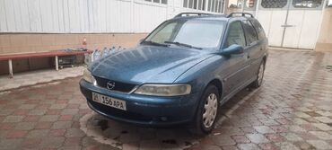 хром фара: Автомобиль Opel Vectra B в кузове универсал, окрашенный в синий цвет