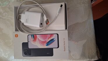 телефон fly fs521 power plus 1: Xiaomi Redmi Note 12, 128 ГБ, цвет - Черный, 
 Face ID, С документами, Отпечаток пальца