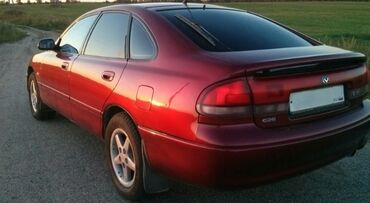 накидка на сиденье авто: Решетка радиатора Mazda 1995 г., Б/у, Аналог